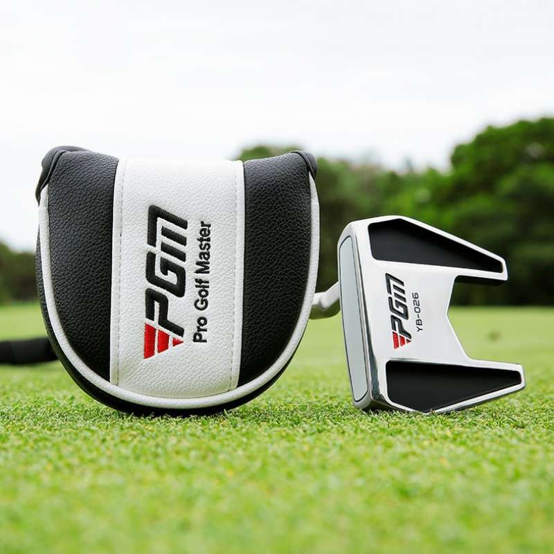 PGM Pro Golf Master putter golf club and headcover resting on the green grass.